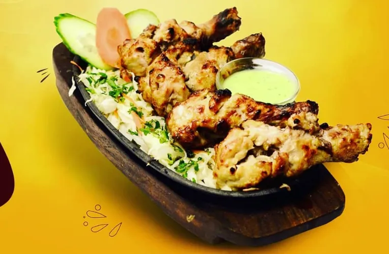 Afghani Chicken Tikka — tandoor-grilled starter at Baba Chicken 34 Street Edmonton